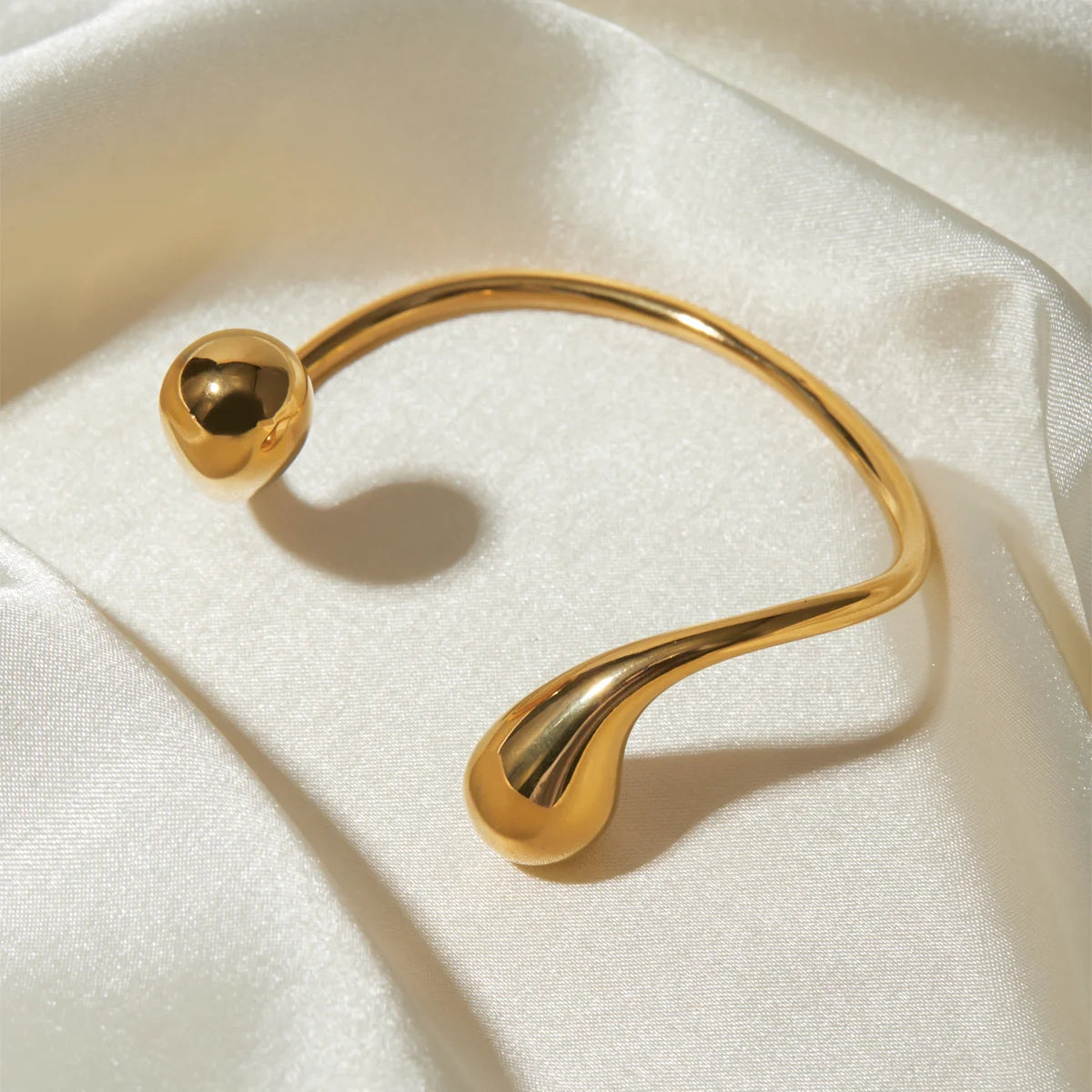 Elegant Gold Drop Cuff Bracelet